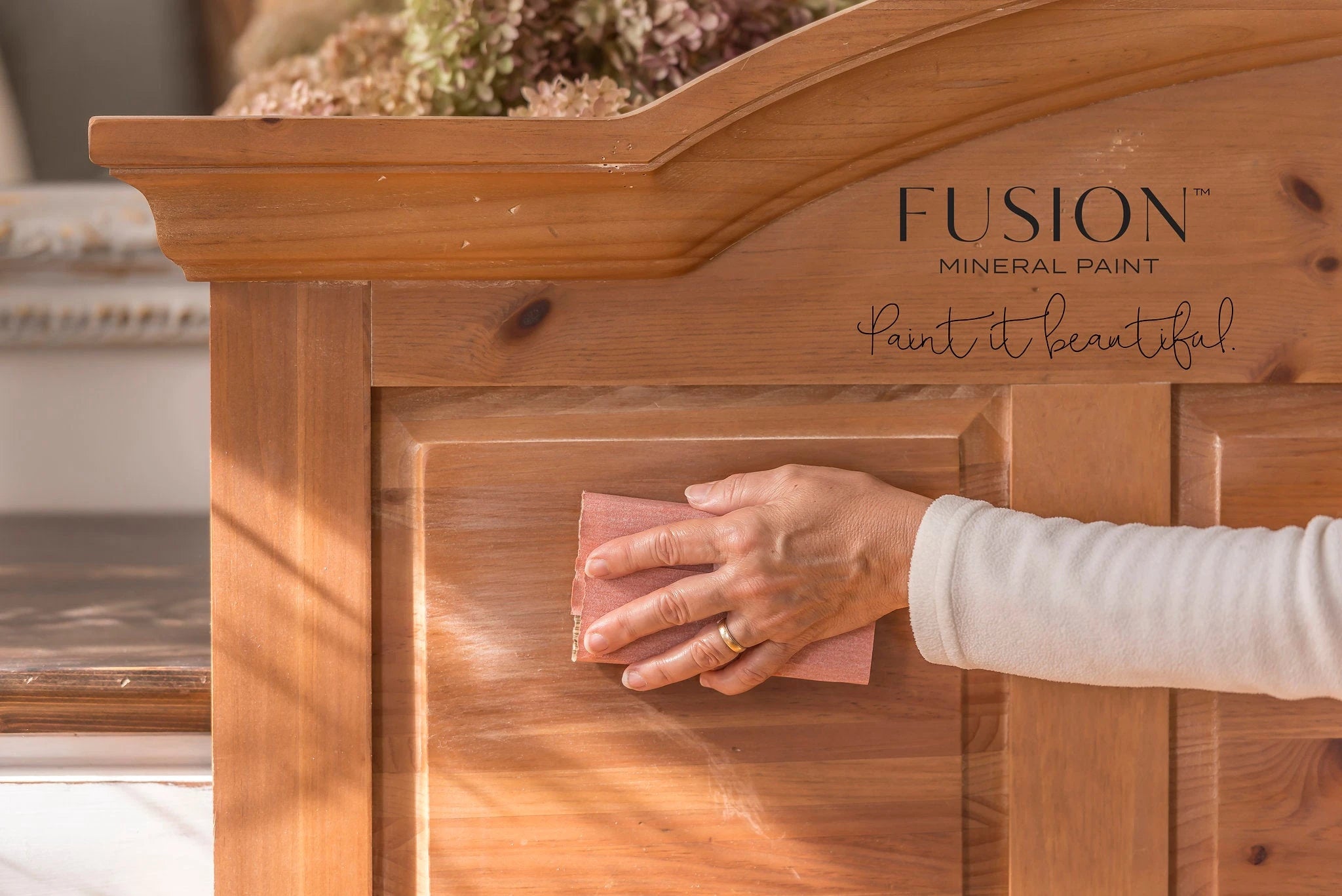 prepping furniture by sanding prior to painting