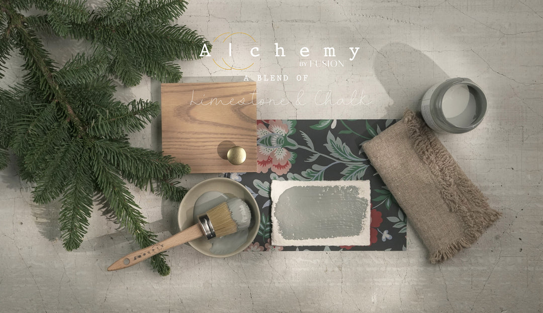 overlay of paint brush in bowl with spruce painted and decor surrounding