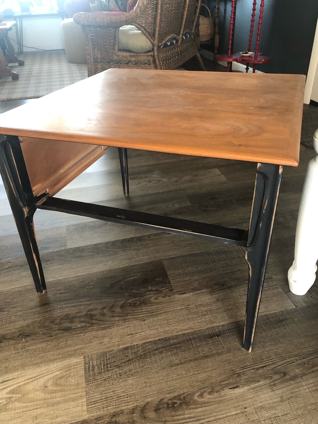 Wood table in original condition photographed in the studio before refinishing or design changes