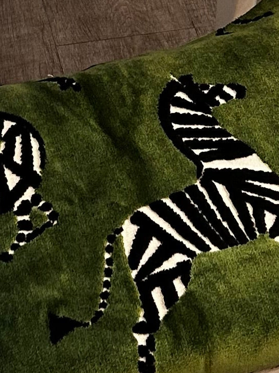 Green velvet-style upholstery fabric with graphic zebra stripe design selected for a one-of-a-kind accent stool